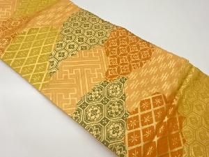 亀甲に紗綾形・七宝模様織出し名古屋帯